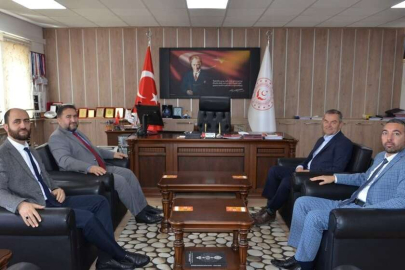 BAŞOĞLU, ÖZBAŞ’I ZİYARET ETTİ