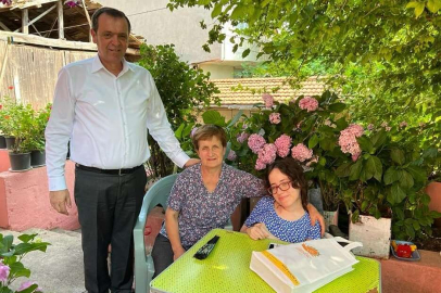 ÖZALP KUŞÇU’YU EVİNDE ZİYARET ETTİ