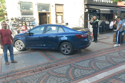 İŞ YERİ ÖNÜNE ÇEKİLEN ARAÇ ÇEKİCİYLE GÖTÜRÜLDÜ