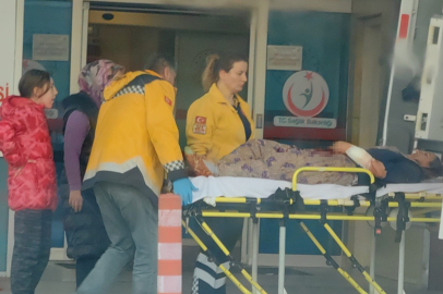 Odun keserken, eşinin kolunu kesti