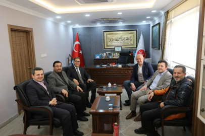 Özdemir, Müftü Yusuf Eviş’i ziyaret etti