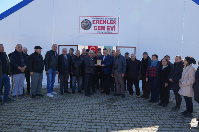 Başkan Bozkurter’e Erenler Cemevi’nde Plaket Takdimi