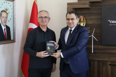 İşbilen’den Kaymakam Balaban’a Kitap Takdimi